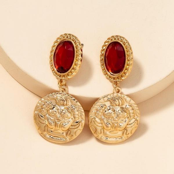 Aretes moneda con diamante rojo